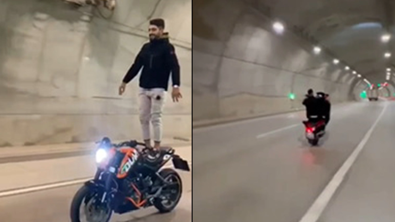 Motosikletlilerin tehlikeli oyunu kamerada: Tek tekerlek üzerine kaldırarak ilerledi