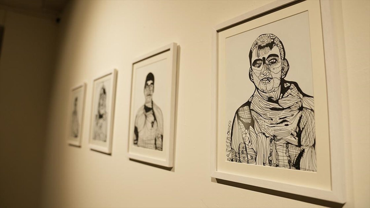 Otizmli sanatçı Remzi Yılmaz'ın sergisi açıldı